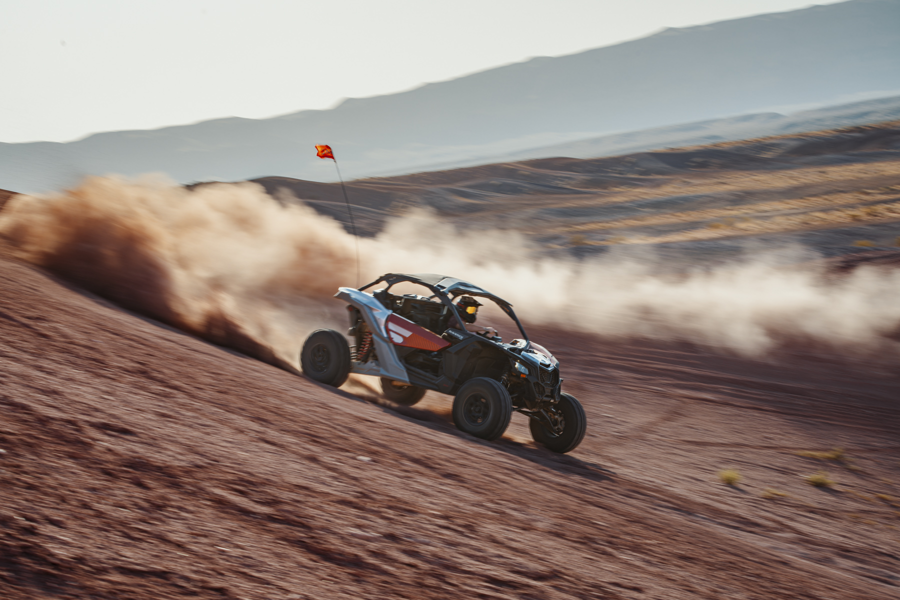 UTV kicking up dust on an exhilarating off-road adventure through Utah’s Purple Hills near Sand Hollow.